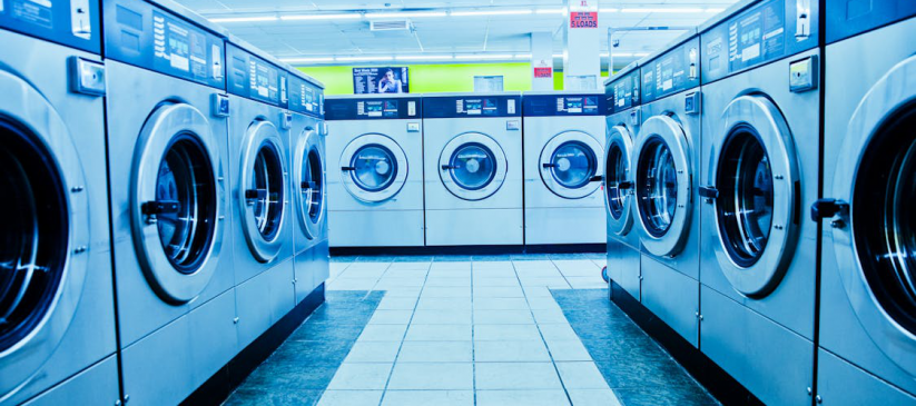 A photo of laundry machines for commercial laundry service