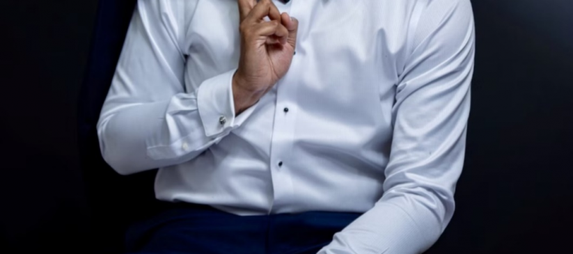 A closeup of a man wearing a Tuxedo